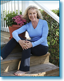 Mature woman sitting on steps